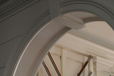 Rounded trim above a door.